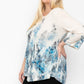 Print Top Featuring A Round Neckline And 3/4 Bell Sleeves